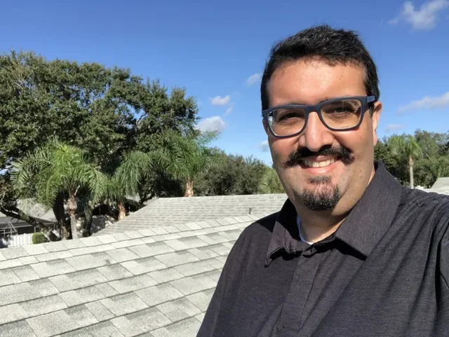 Fred Rodrigues photographed on a roof
